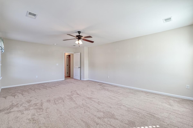 carpeted empty room with ceiling fan