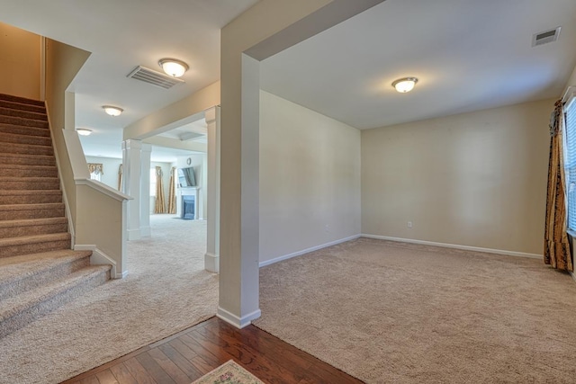 spare room with wood-type flooring