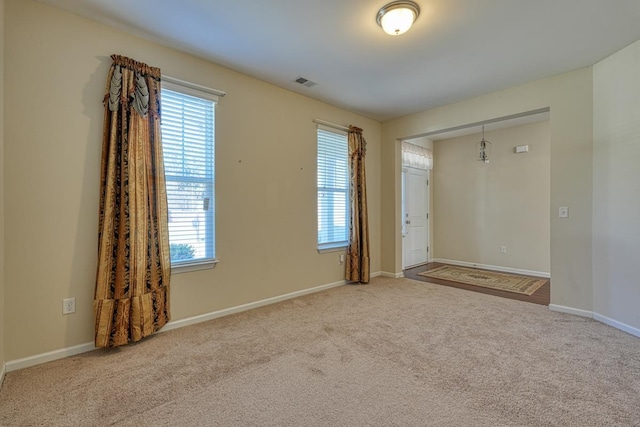 view of carpeted spare room