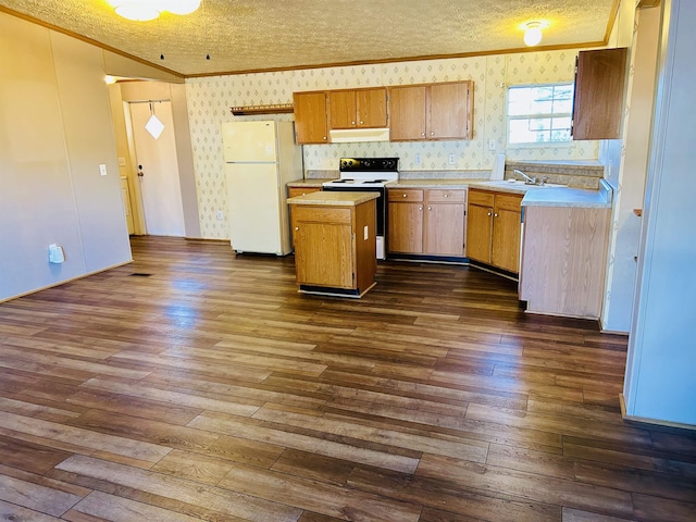 kitchen featuring a textured ceiling, a kitchen island, dark wood-type flooring, and white appliances