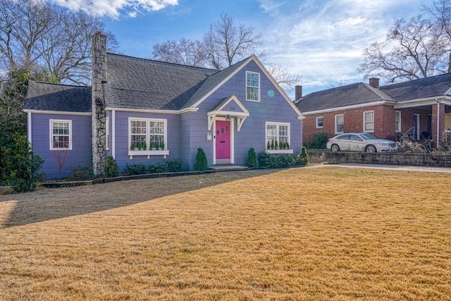 view of front of house with a front lawn