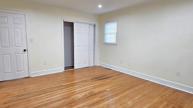 unfurnished bedroom featuring light hardwood / wood-style floors