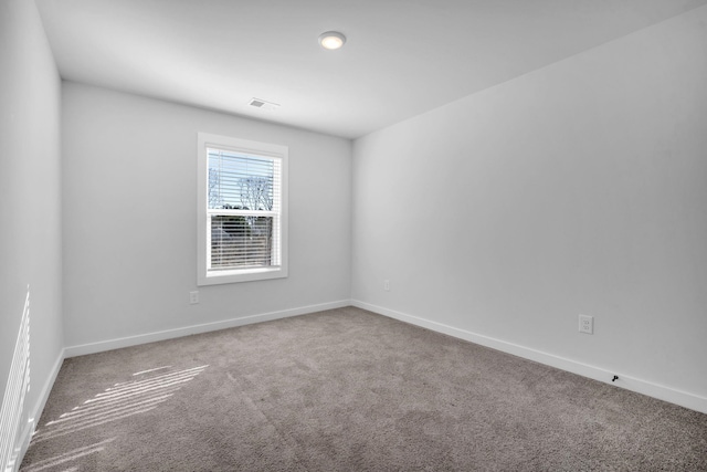 empty room with carpet floors