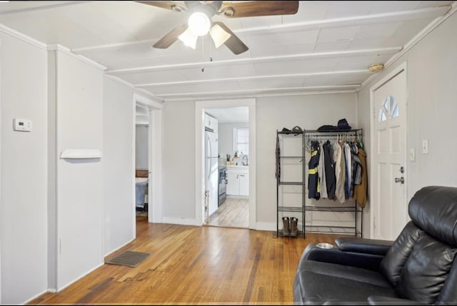 sitting room featuring hardwood / wood-style floors