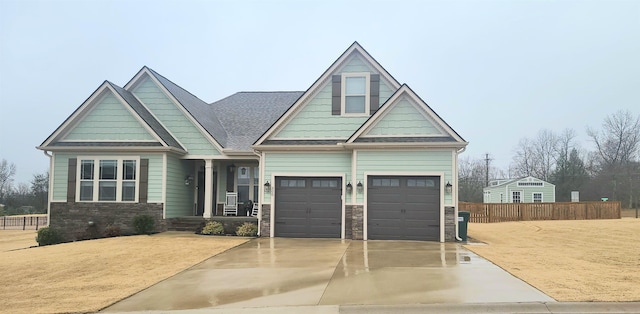 craftsman house featuring a garage