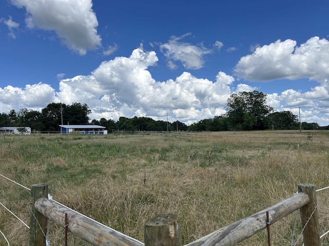 view of yard featuring a rural view