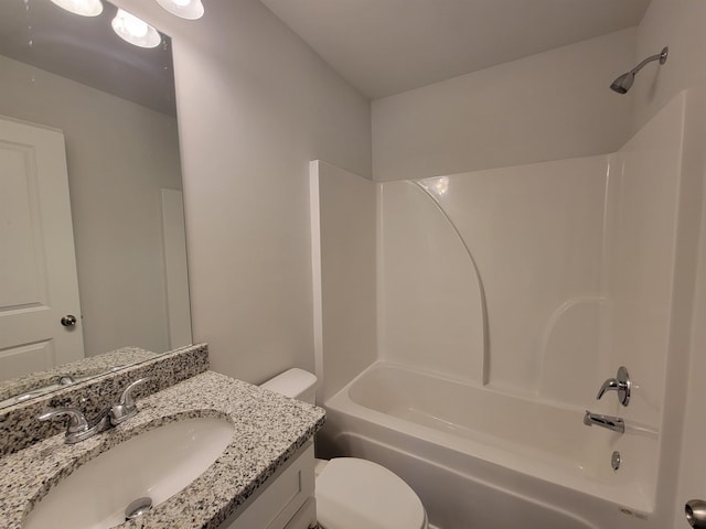 full bathroom with vanity, toilet, and shower / washtub combination