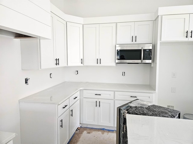 kitchen with white cabinets