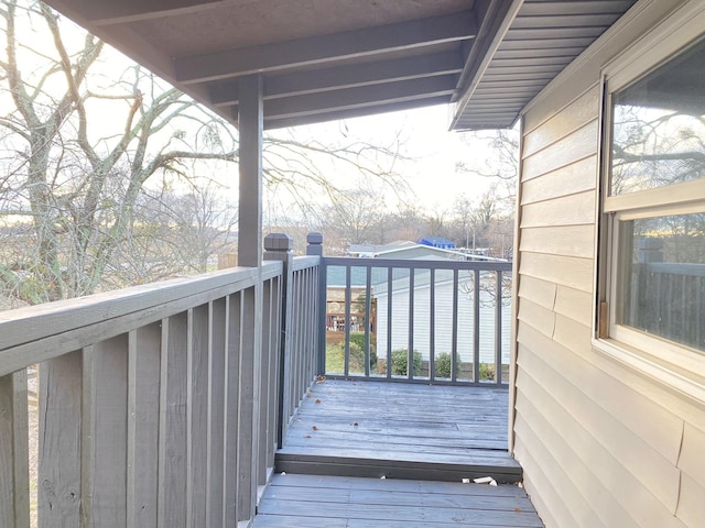 wooden deck with a water view