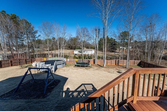 view of yard with a trampoline