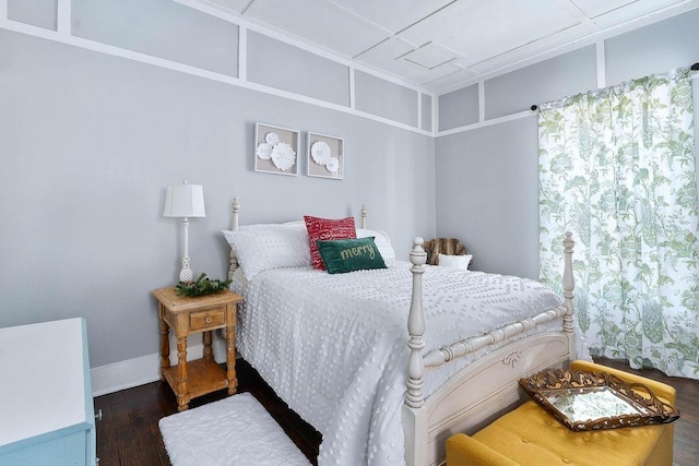 bedroom featuring dark hardwood / wood-style floors