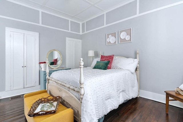 bedroom featuring dark hardwood / wood-style floors