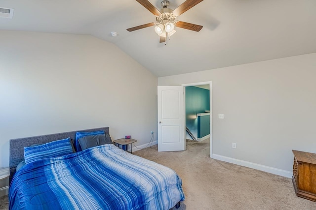 carpeted bedroom with ceiling fan and lofted ceiling