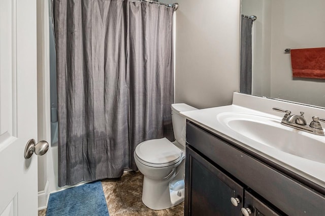 full bathroom with vanity, toilet, and shower / bath combo with shower curtain