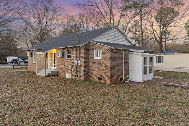 view of property exterior at dusk