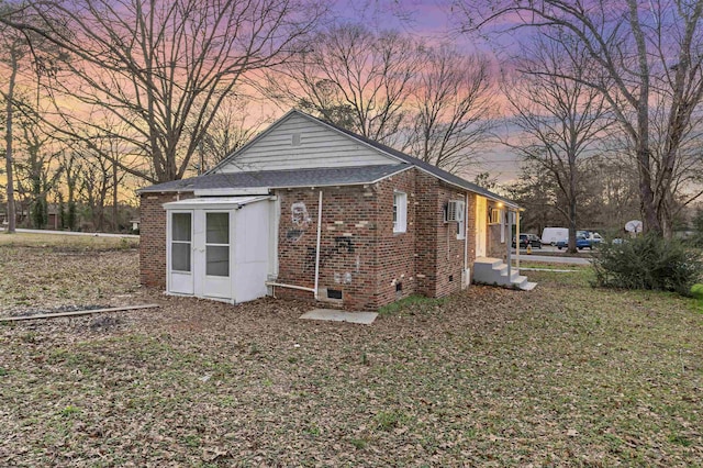 view of property exterior at dusk