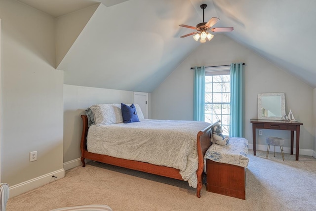 carpeted bedroom featuring ceiling fan and lofted ceiling