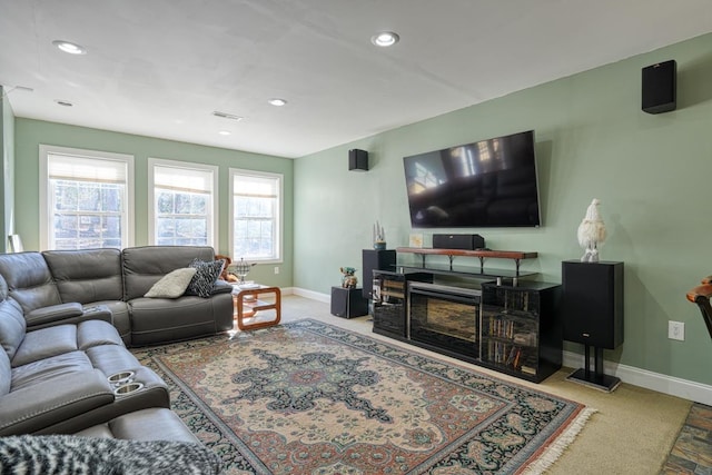 living room featuring a fireplace