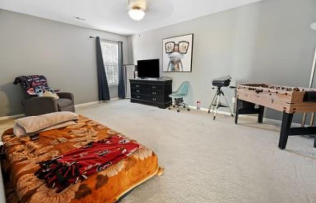 bedroom featuring carpet flooring