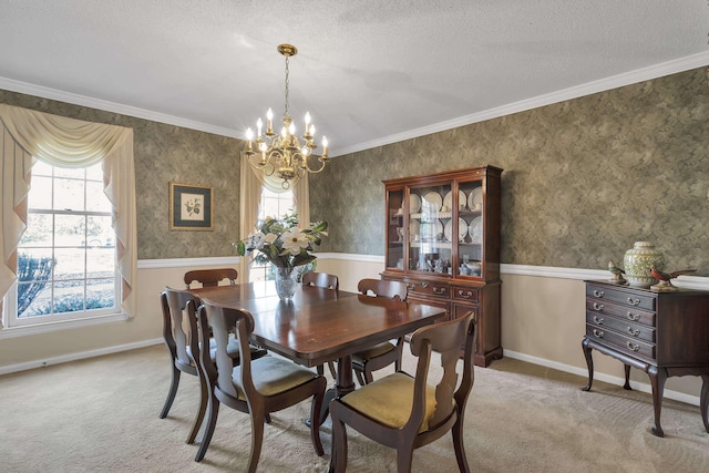 carpeted dining area featuring a textured ceiling, a notable chandelier, a healthy amount of sunlight, and crown molding