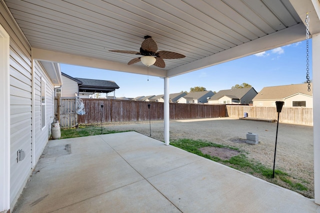 view of patio featuring ceiling fan