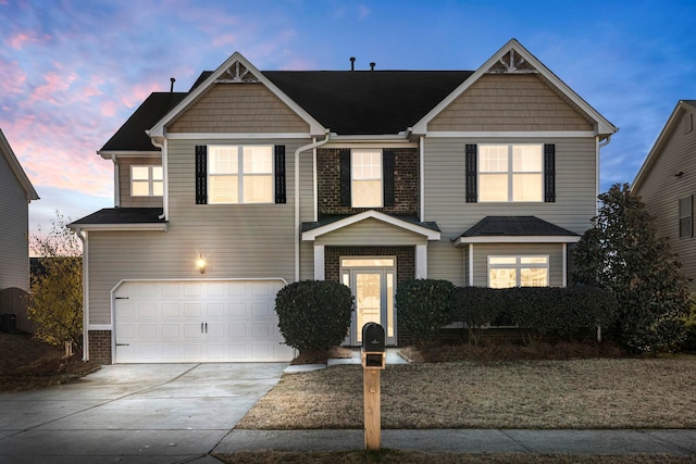 view of front of house with a garage