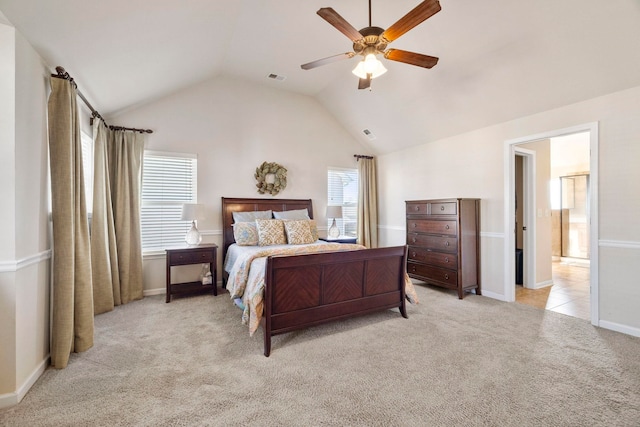 bedroom with ceiling fan, light carpet, and multiple windows