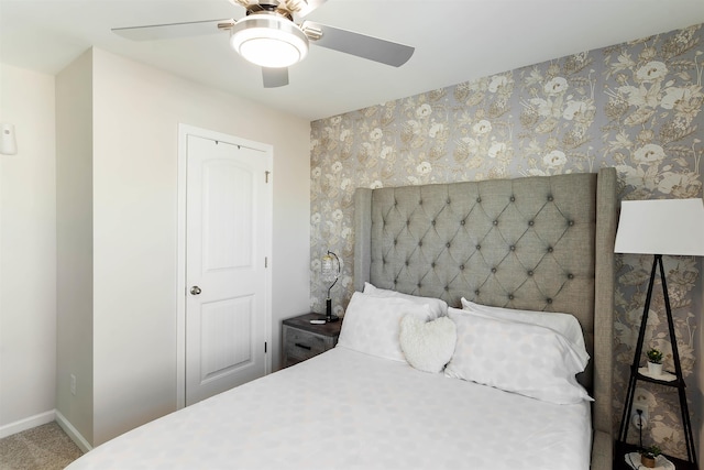 carpeted bedroom featuring ceiling fan