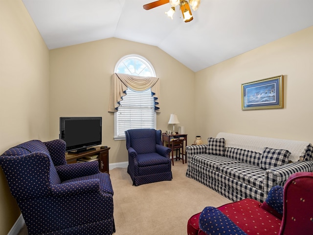 living room with light carpet, vaulted ceiling, and ceiling fan