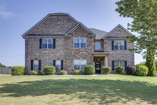 view of front of home with a front lawn