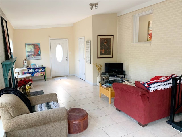 tiled living room with brick wall