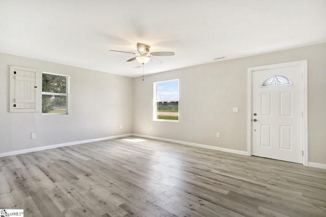 entrance foyer with light wood-type flooring and ceiling fan