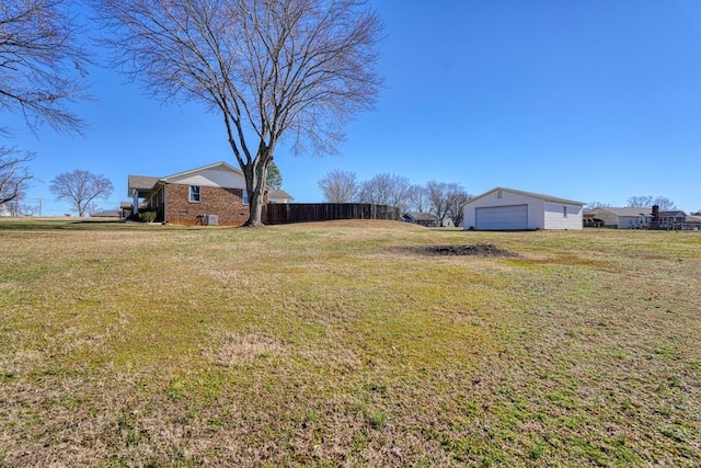 view of yard with a garage