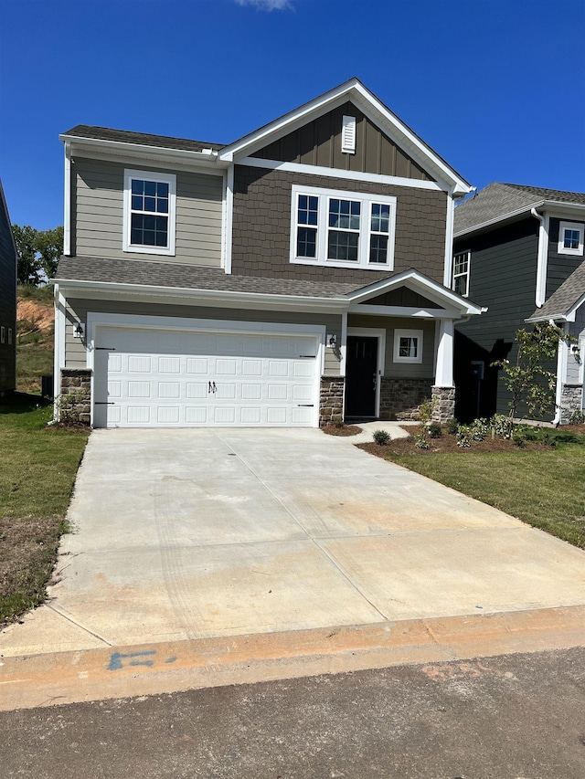 craftsman house with a garage