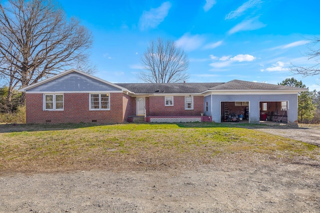 ranch-style house featuring a front yard and a carport