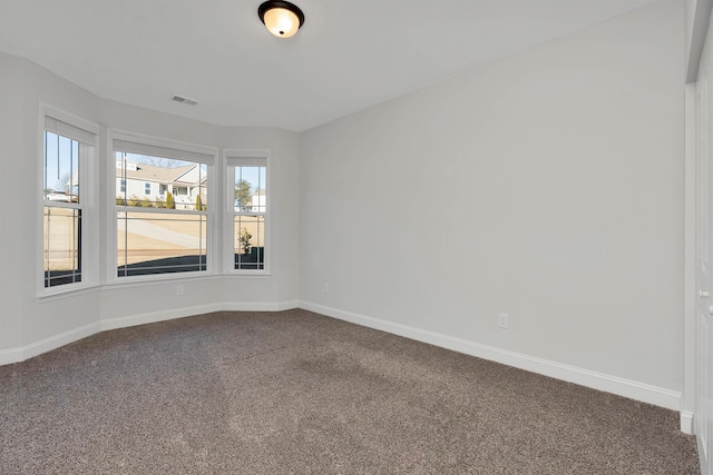 view of carpeted spare room