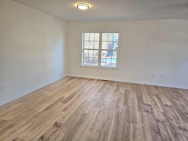 empty room featuring light wood-type flooring