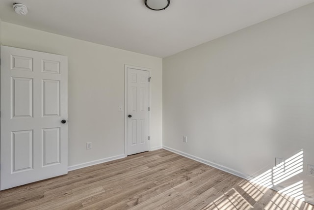 unfurnished bedroom featuring light hardwood / wood-style flooring