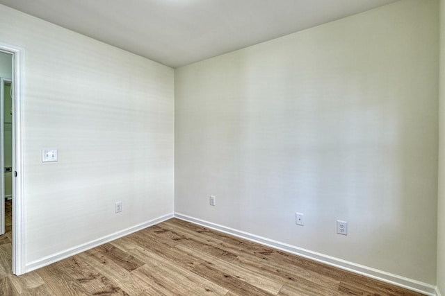 unfurnished room featuring light wood-type flooring