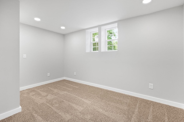 unfurnished room featuring carpet floors