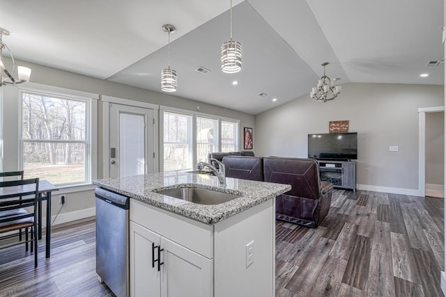 kitchen featuring sink, white cabinets, stainless steel dishwasher, hanging light fixtures, and dark hardwood / wood-style flooring