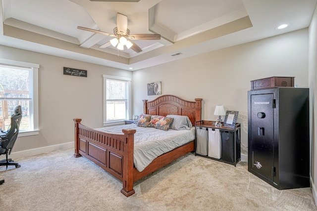 carpeted bedroom featuring a raised ceiling, beam ceiling, ceiling fan, and coffered ceiling