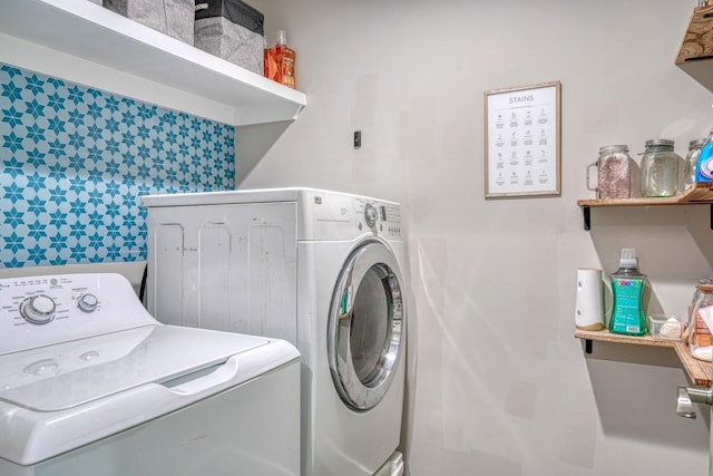 laundry room featuring washing machine and dryer