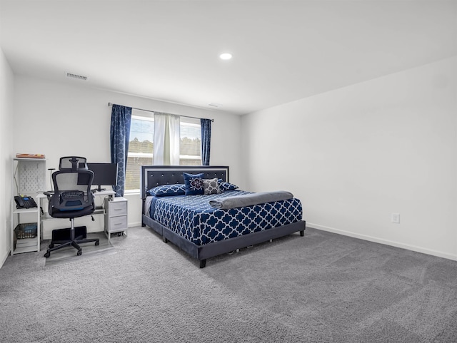 bedroom featuring carpet