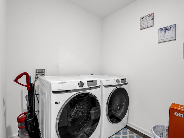 laundry room with washer and dryer