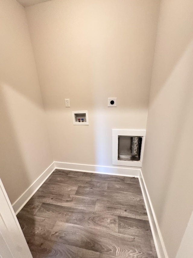 laundry room with hookup for a washing machine, hookup for an electric dryer, and dark hardwood / wood-style flooring