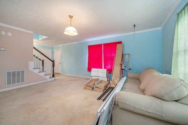 living room with a textured ceiling, ornamental molding, and light carpet