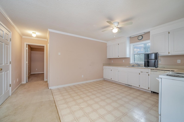 kitchen with white appliances, white cabinetry, ceiling fan, and a textured ceiling