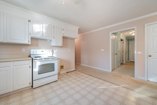 kitchen featuring white electric range, white cabinets, light carpet, and crown molding