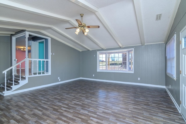 additional living space featuring hardwood / wood-style floors, a textured ceiling, ceiling fan, and vaulted ceiling